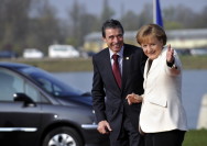 Chancellor Angela Merkel welcomes the Danish Prime Minister Anders Fogh Rasmussen to the NATO summit at the footbridge, the Passerelle des deux Rives, in KehlGipfel