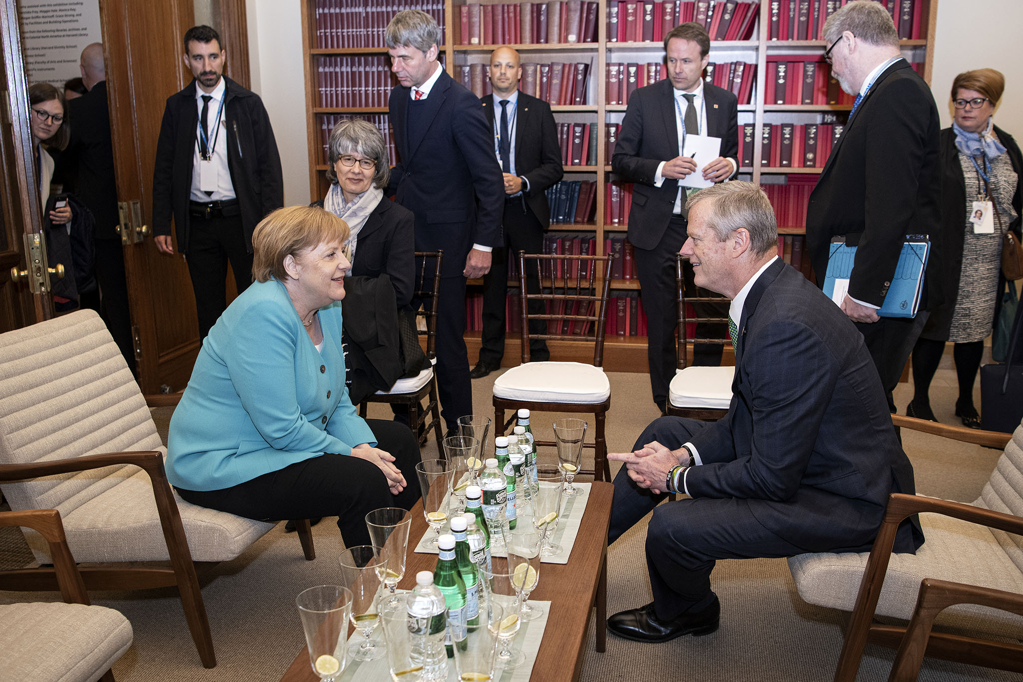 Chancellor Angela Merkel talks with the Governor of Massachusetts, Charles Baker.