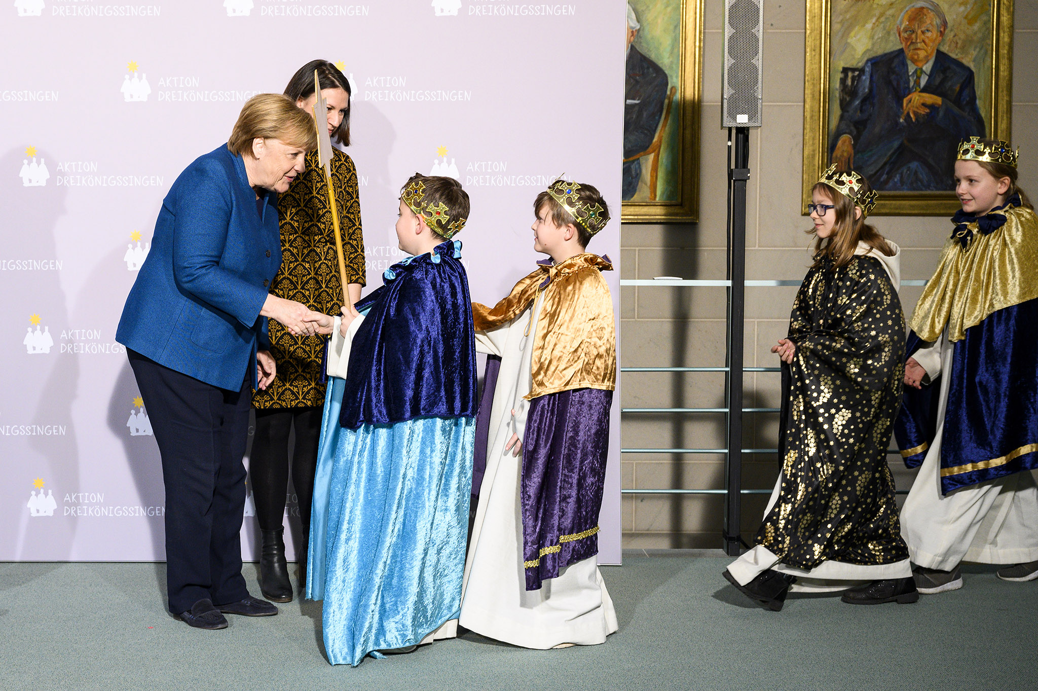 Chancellor Angela Merkel welcomes star singers to the Federal Chancellery.
