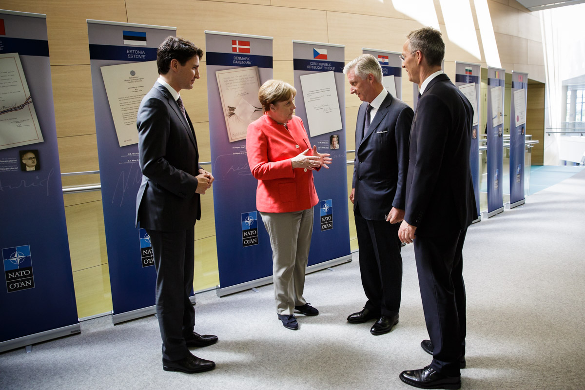 Chancellor Angela Merkel on her arrival at the NATO summit in Brussels, in conversation with NATO Secretary General Jens Stoltenberg, King Philippe of Belgium and Canadian Prime Minister Justin Trudeau