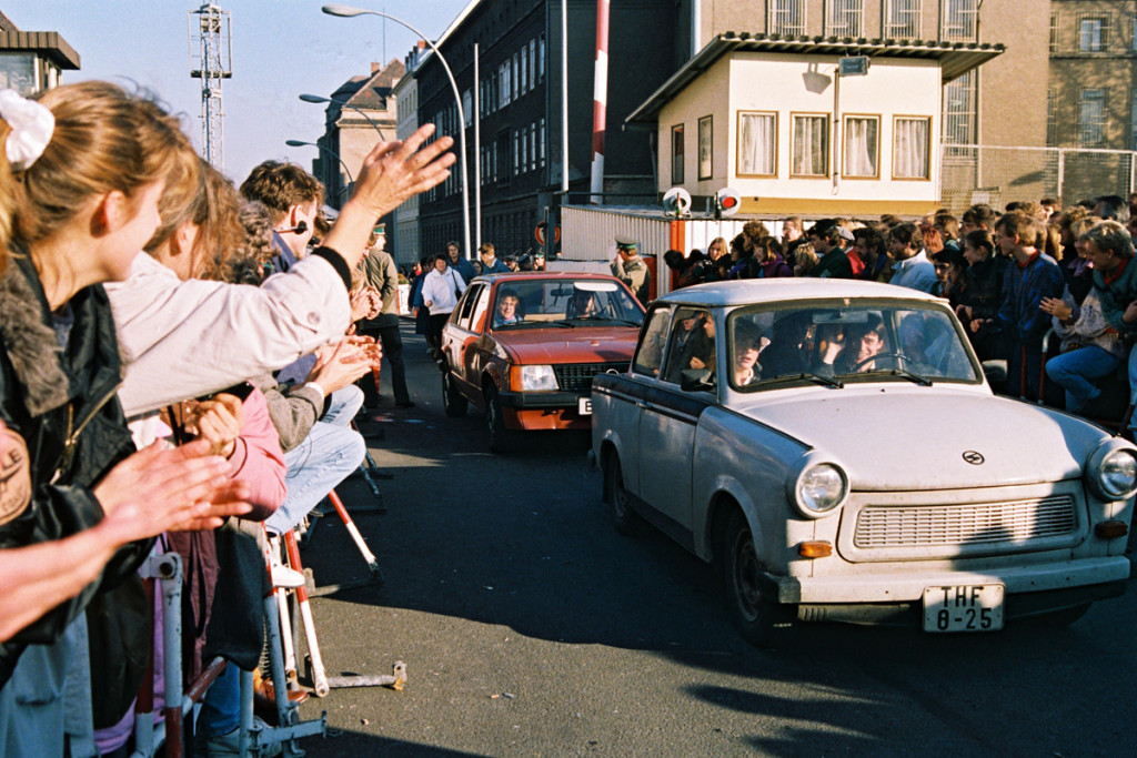 East Germans drive across the border into West Berlin.