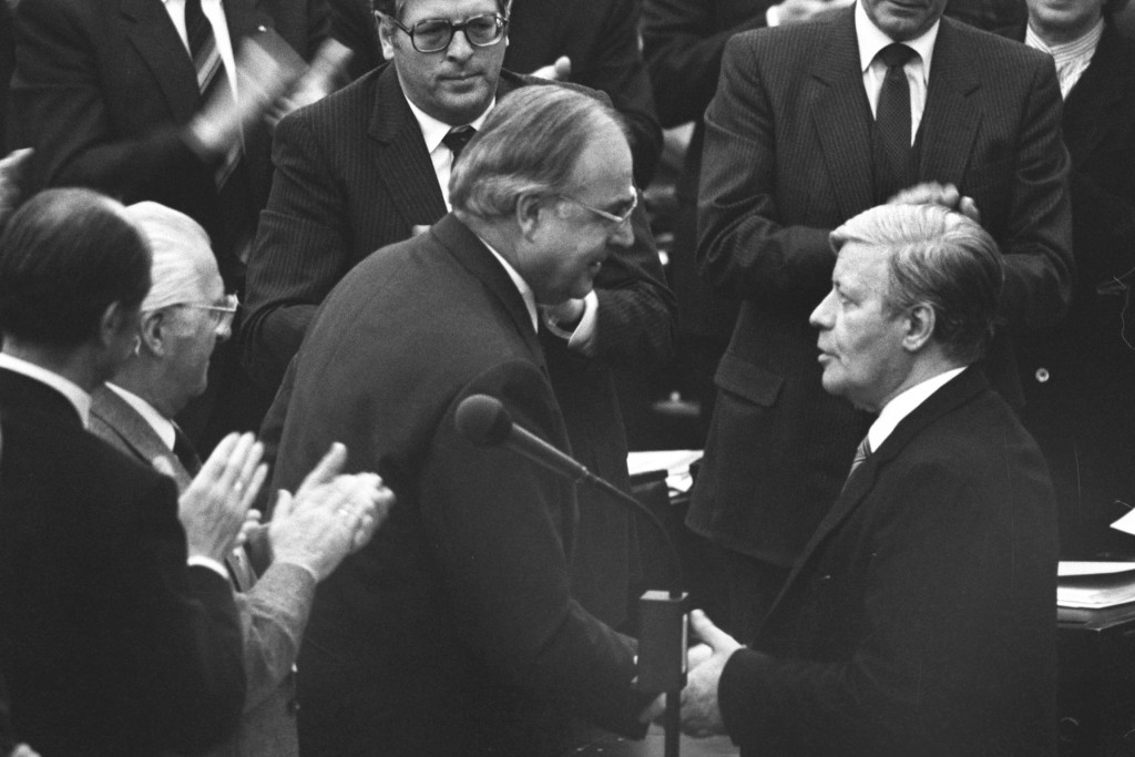 Former Chancellor Helmut Schmidt (at right) congratulates Helmut Kohl on his election to the office of Chancellor in the German Bundestag.