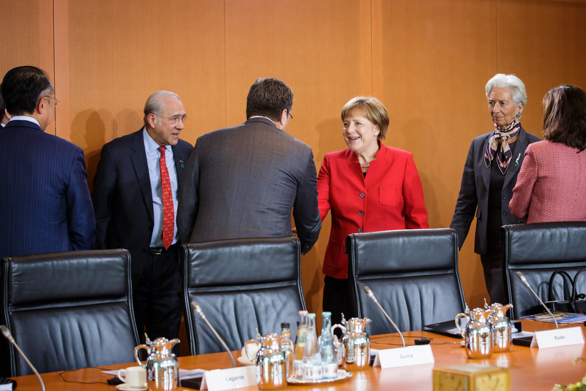 Bundeskanzlerin Angela Merkel mit den Vorsitzenden der fünf internationalen Wirtschafts- und Finanzorganisationen.