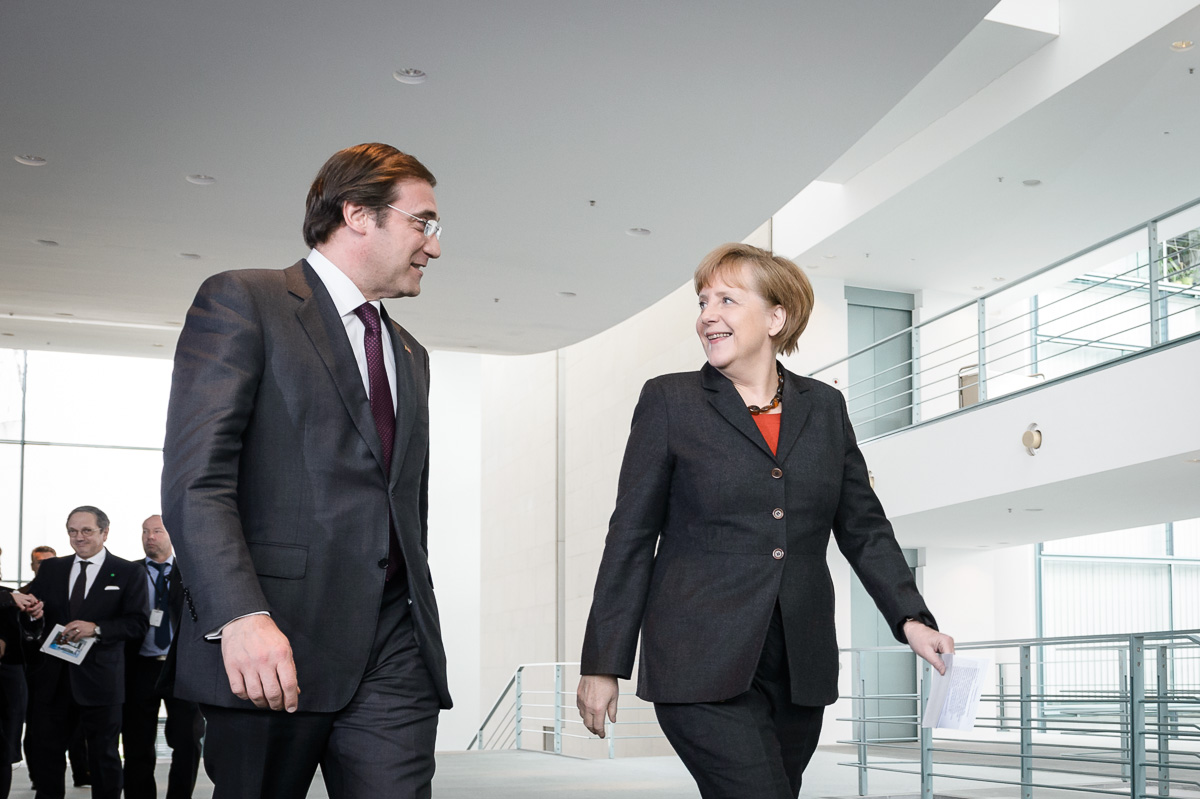 Chancellor Angela Merkel welcomes the Portuguese Prime Minister Pedro Passos Coelho on his arrival at the Federal Chancellery.