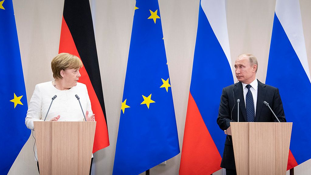 Chancellor Angela Merkel at a joint press conference with Russia's President Vladimir Putin
