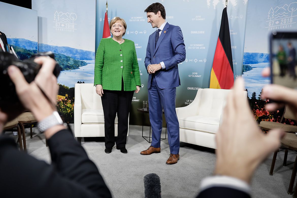 Chancellor Angela Merkel with Canadian Prime Minister Justin Trudeau at the G7 summit in La Malbaie, Canada