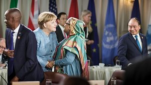 La chancelière fédérale Angela Merkel lors du sommet du G7 à La Malbaie, au Canada, en séance de travail avec les pays du dialogue élargi (Outreach)