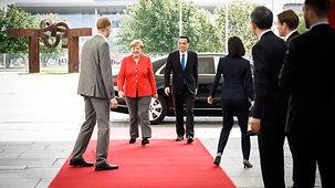 Chancellor Angela Merkel welcomes Li Keqiang, China's Prime Minister, to the Federal Chancellery.