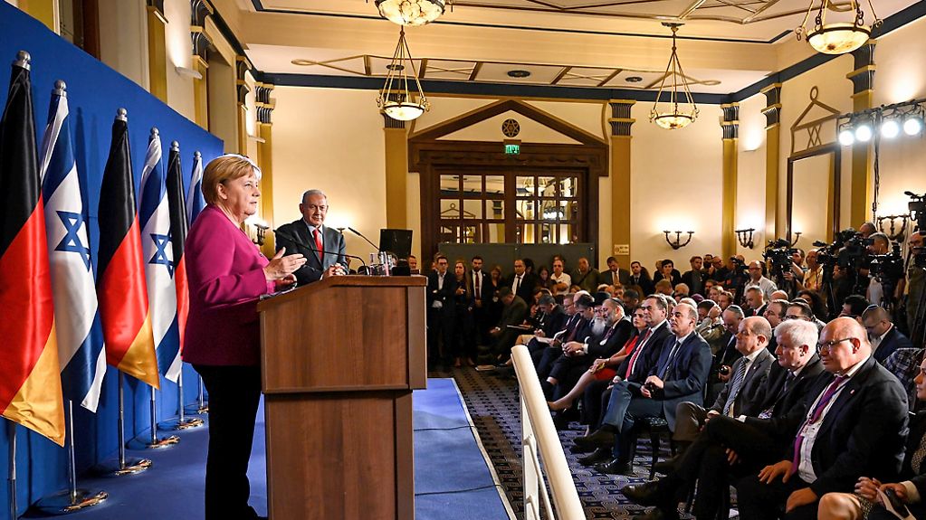 Chancellor Angela Merkel speaks at a press conference.