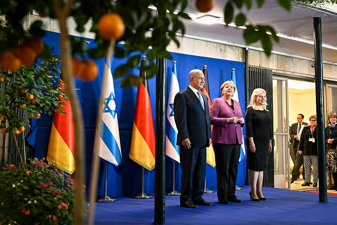 Chancellor Angela Merkel is welcomed to the German-Israeli government consultations by Israel's Prime Minister Benjamin Netanyahu.