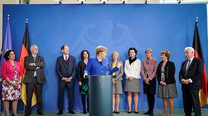Bundeskanzlerin Angela Merkel bei der Übergabe des Tätigkeitsberichts 2018 des Nationalen Normenkontrollrates (NKR).