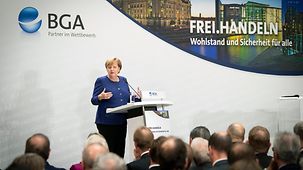 Chancellor Angela Merkel speaks at the BGA, the Federation of German Wholesale, Foreign Trade and Services, in Berlin.