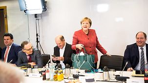 Chancellor Angela Merkel arrives at the Cabinet meeting