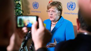 Bundeskanzlerin Angela Merkel bei einem Statement anlässlich der Konferenz zur Annahme des UN-Migrationspakts.