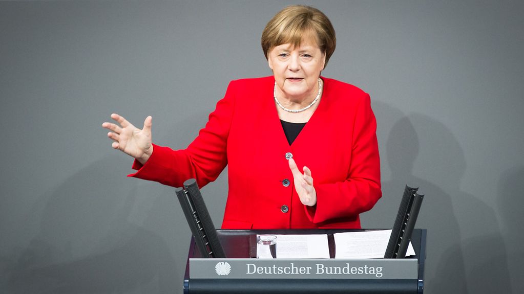 Chancellor Angela Merkel delivers a government statement in the German Bundestag.