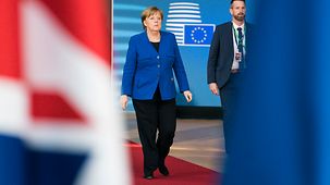 Chancellor Angela Merkel arrives at the special European Council meeting.
