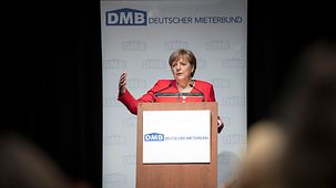 Chancellor Angela Merkel speaks at the annual meeting of the DMB (German Tenants' Association).