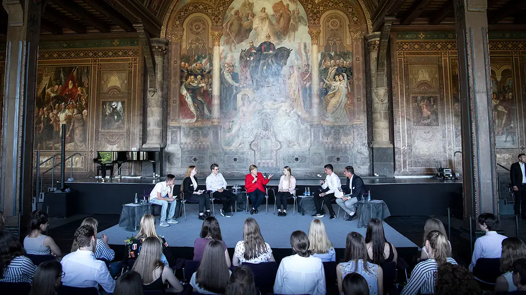 Chancellor Angela Merkel during a discussion with young people