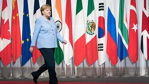 Chancellor Angela Merkel arrives at the G20 summit in Osaka.
