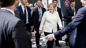 Chancellor Angela Merkel on the way to the military parade