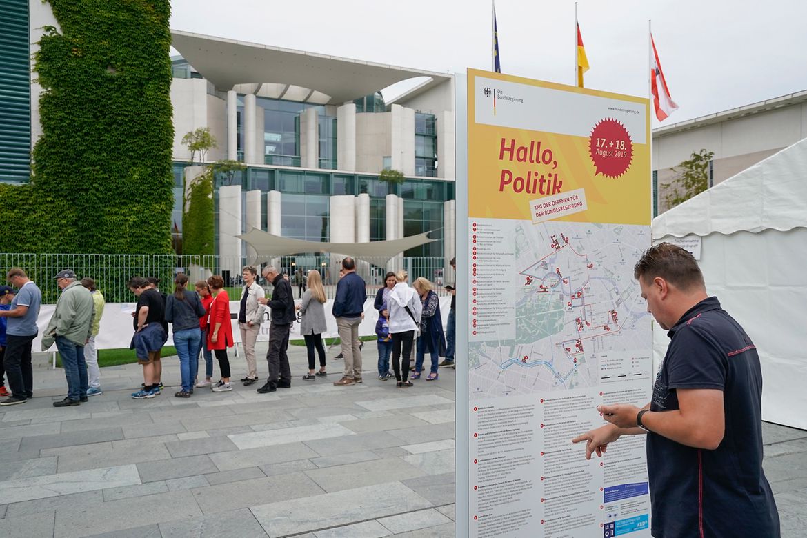A visitor arrives at the Federal Chancellery for the German government's open day.