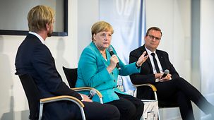 Chancellor Angela Merkel speaks at the readers' forum organised by the newspaper, Ostsee-Zeitung.