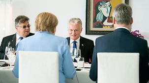 Chancellor Angela Merkel during lunch with Lithuania's President, Gitanas Nauseda