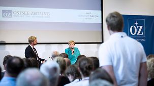 Chancellor Angela Merkel speaks at the readers' forum organised by the newspaper, Ostsee-Zeitung.