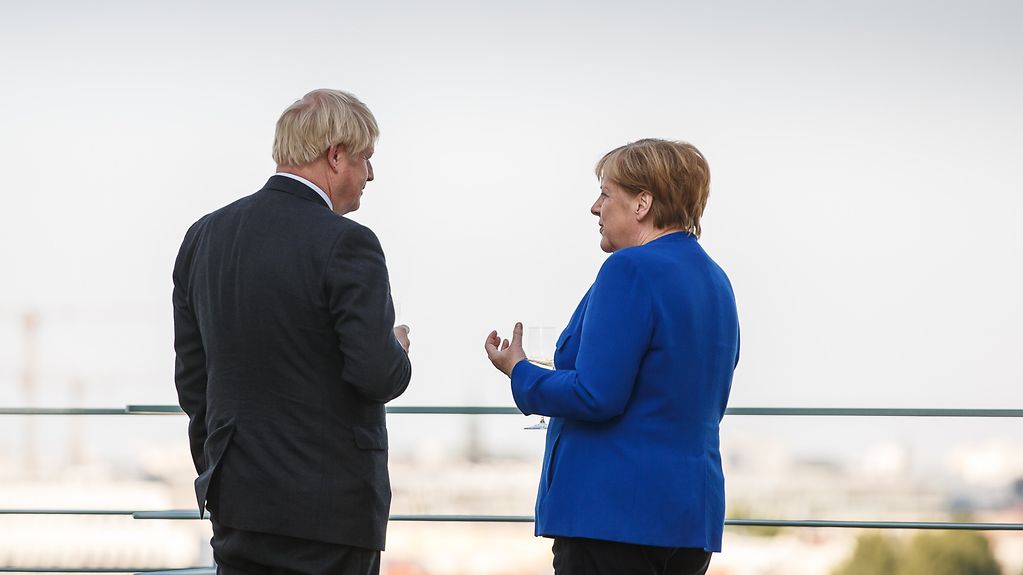 Chancellor Angela Merkel and the new British Prime Minister Boris Johnson on a terrace of the Federal Chancellery