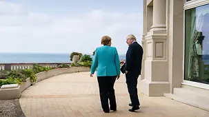 Chancellor Angela Merkel in discussion with British Prime Minister Boris Johnson during the G7 summit in Biarritz