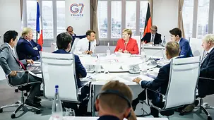 Chancellor Angela Merkel and the other G7 leaders during the first working session