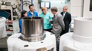 Chancellor Angela Merkel during a visit to the company ZF-Powertrain in China