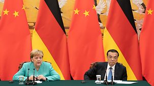 Chancellor Angela Merkel and China's Prime Minister Li Keqiang at a joint press conference