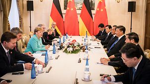 La chancelière fédérale Angela Merkel s’entretient avec le président chinois Xi Jinping