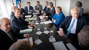 Bundeskanzlerin Angela Merkel mit Emmanuel Macron, Frankreichs Präsident, und Boris Johnson, Großbritanniens Premierminister.