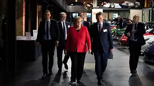 Chancellor Angela Merkel arrives at the annual meeting of the Association of German Chambers of Industry and Commerce.