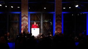 Chancellor Angela Merkel speaks at the annual meeting of the Association of German Chambers of Industry and Commerce (DIHK).