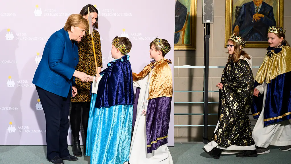 Chancellor Angela Merkel welcomes star singers to the Federal Chancellery.