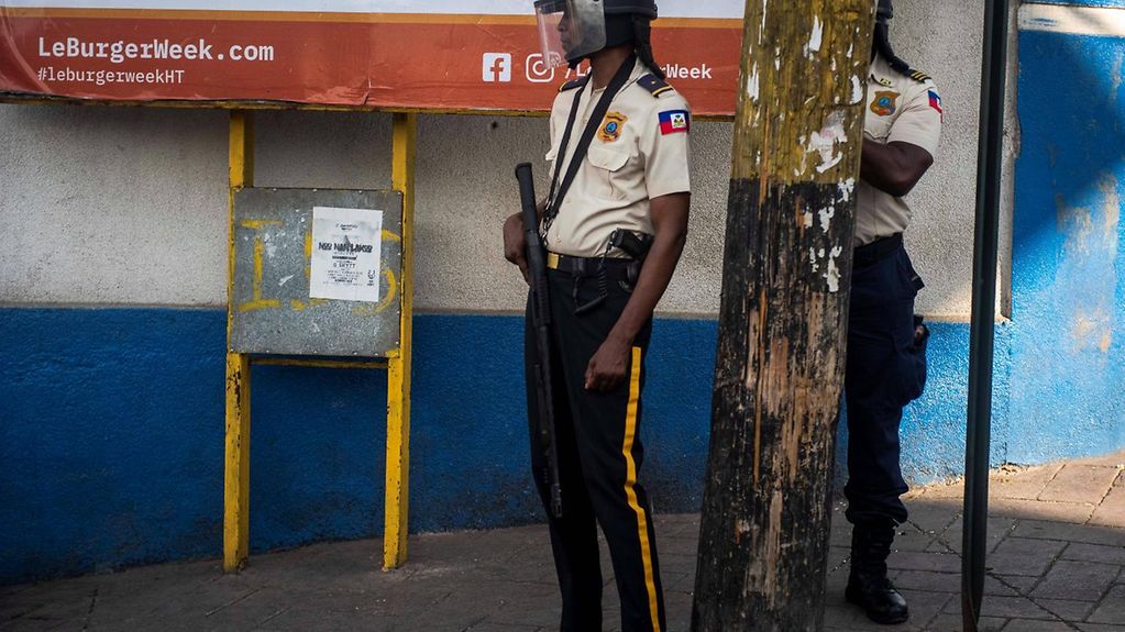 Photo shows police officers in Haiti.