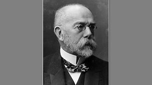 Schwarz-Weiß-Foto von Robert Koch, Porträtaufnahme.