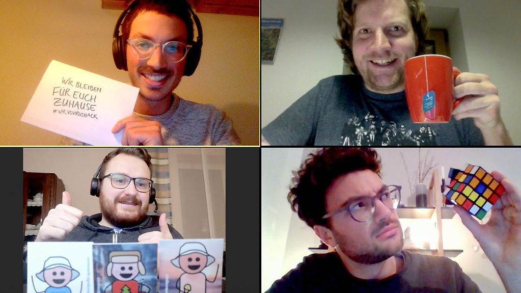 Das Bild zeigt vier Teammitglieder von "meinegemeinde.digital": Raphael Mayer, Simon Zebrowski, Julian Zeschko und Maximilian Mayer. 