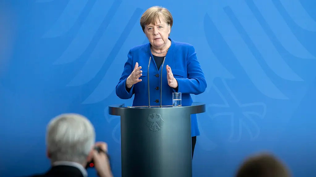 Chancellor Angela Merkel speaks.