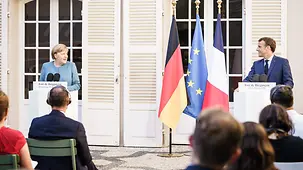 Chancellor Angela Merkel speaks at a press conference.