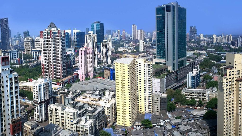 The photo shows the Mumbai skyline.