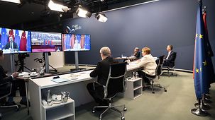 Chancellor Angela Merkel at the Federal Chancellery during a video conference between the EU and China