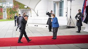 Chancellor Angela Merkel welcomes Iraqi Prime Minister Mustafa al-Kadhimi.