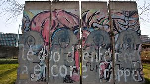 Four painted sections of the Berlin Wall