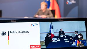 Chancellor Angela Merkel speaks during a video conference with Jean Castex, the French Prime Minister.