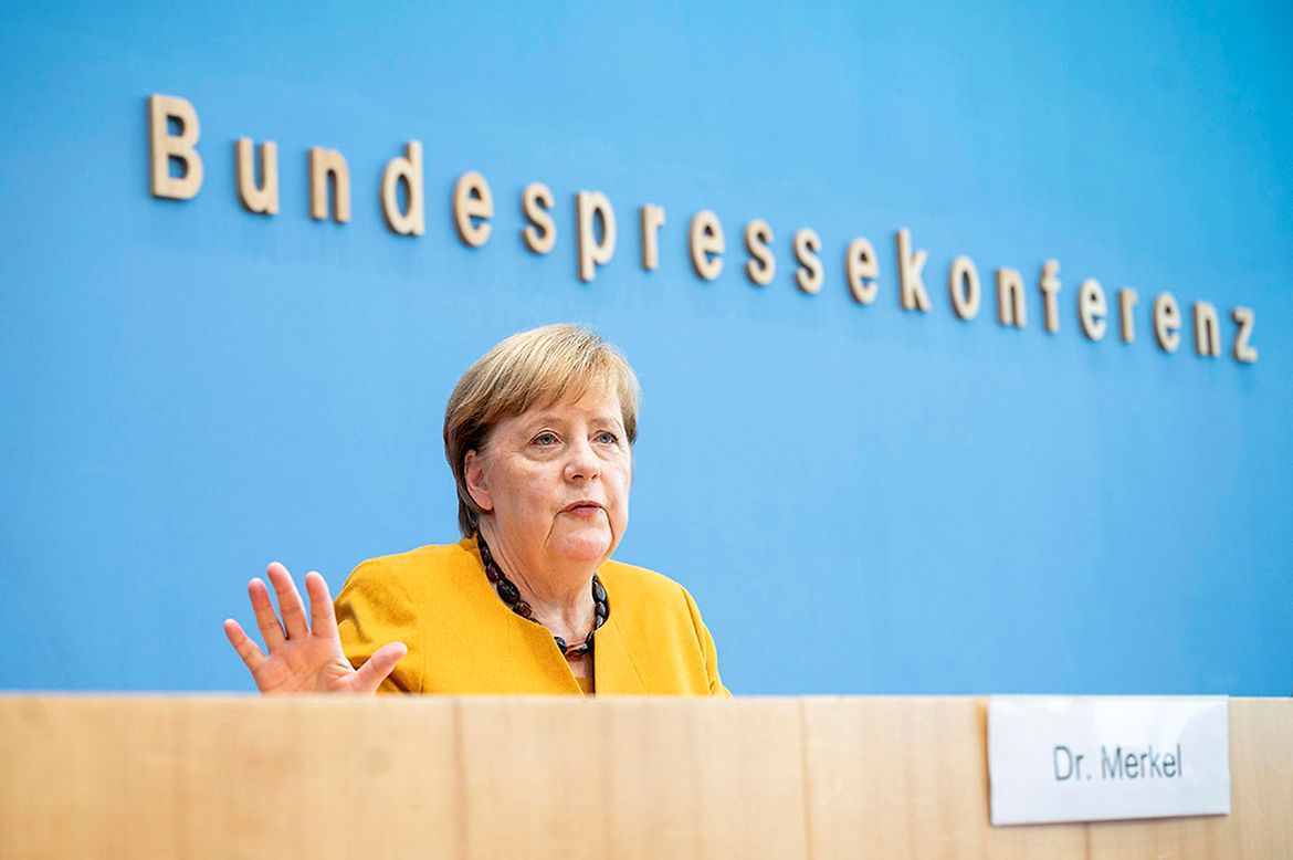 Chancellor Angela Merkel speaks at a press conference.