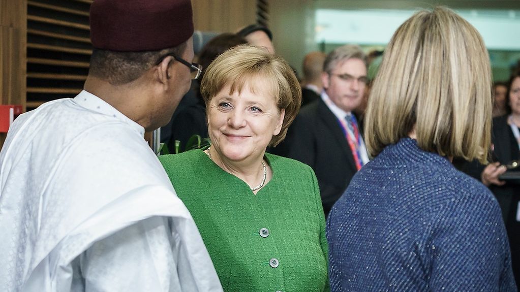 Angela Merkel en discussion